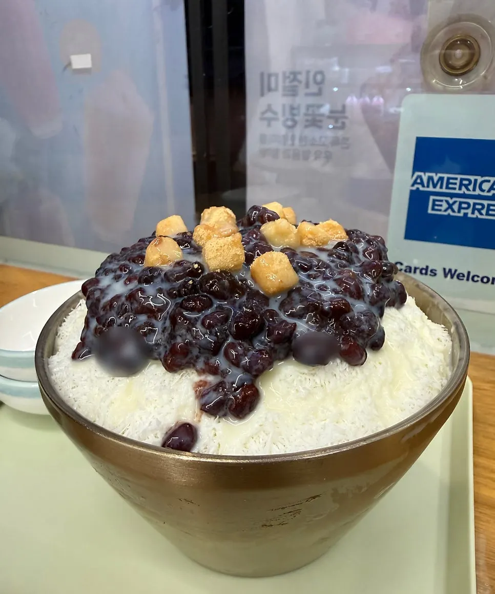 The Sweetree menu board listing coffee, waffles, and bingsu