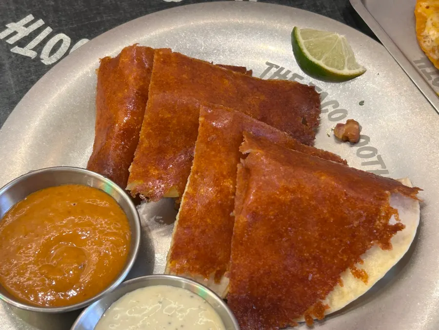Plate of birria tacos shared between two