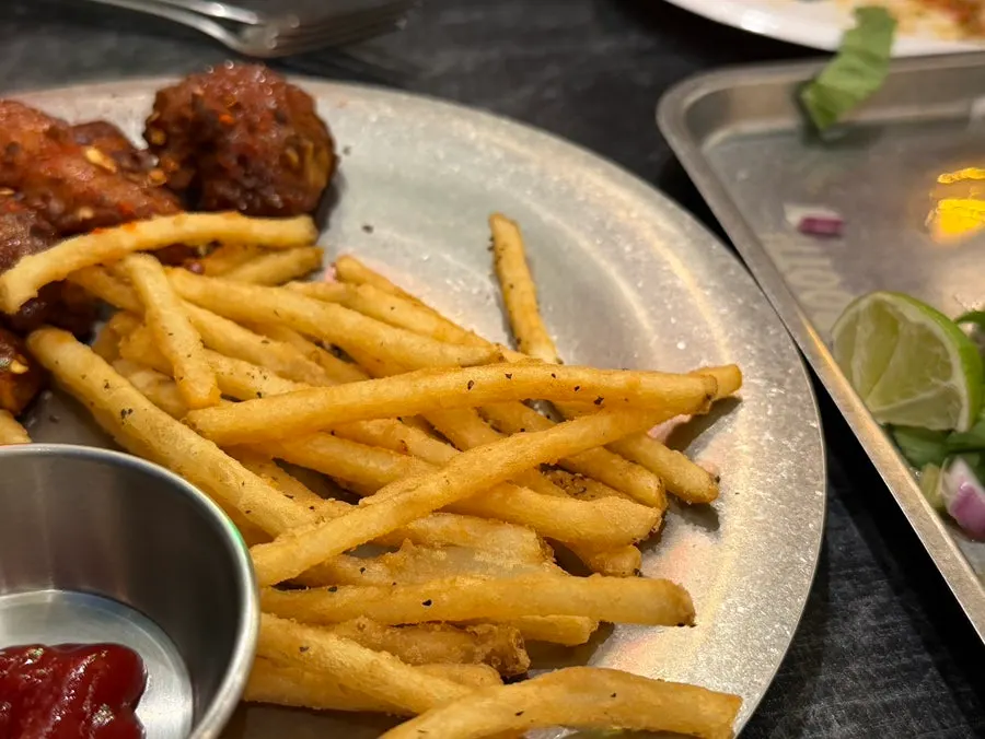 Close-up of sauce-coated buffalo wings