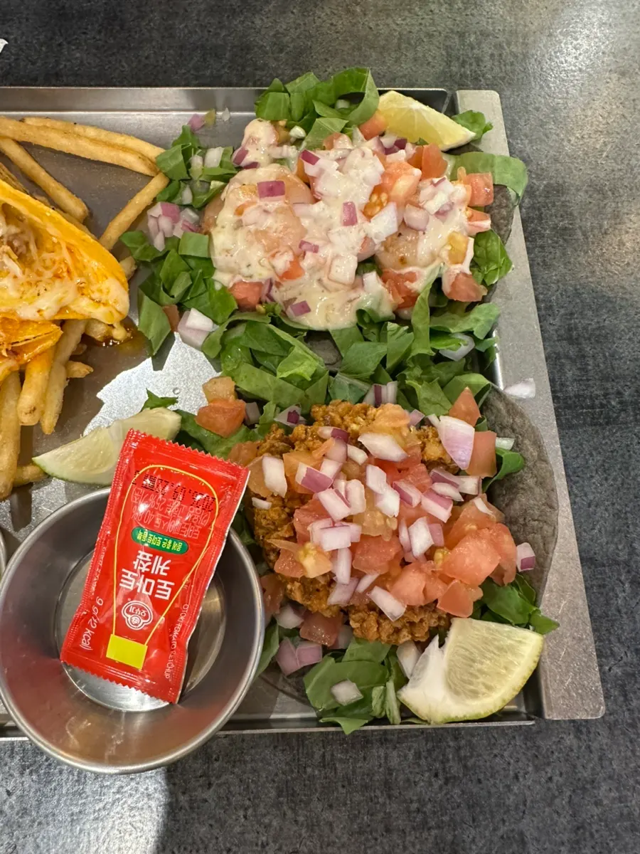 Close-up of a taco topped with lime