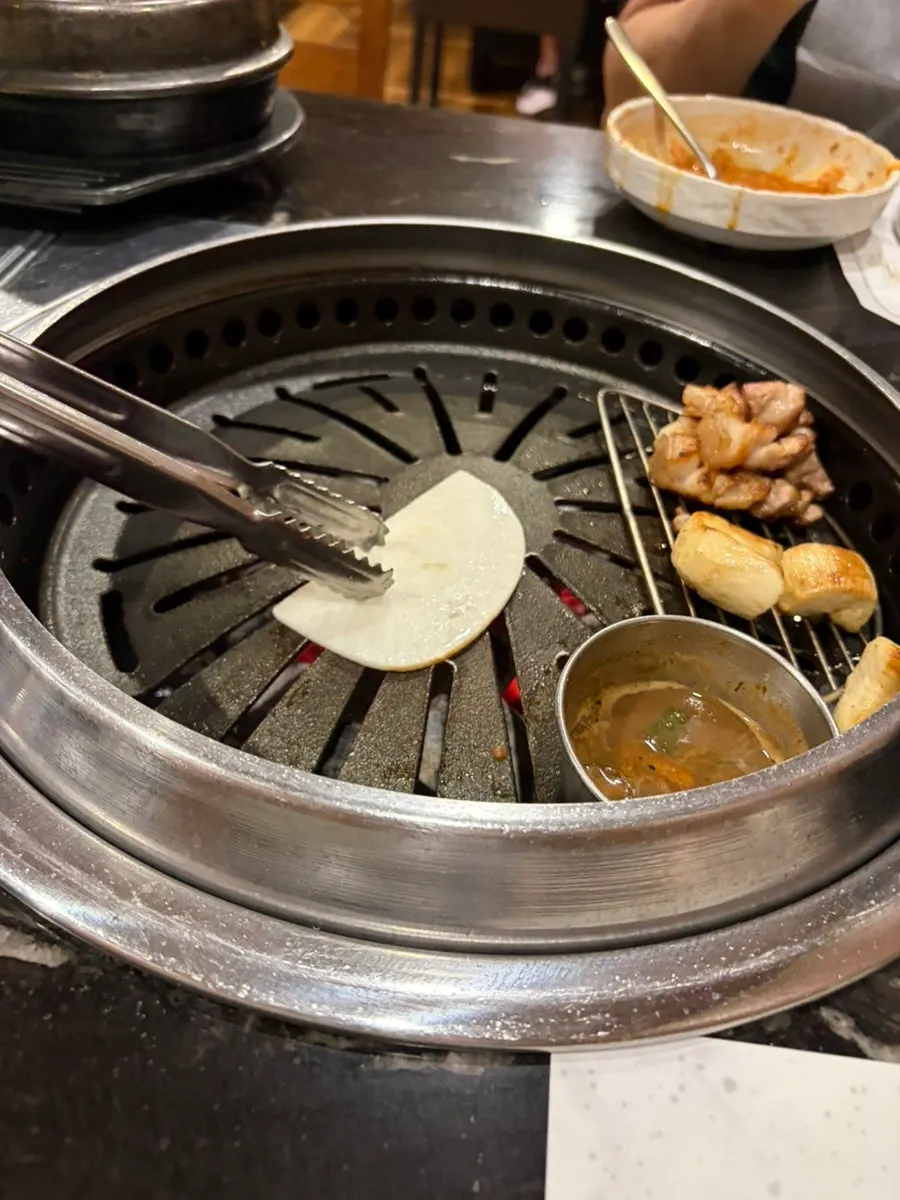 A plate with 2 servings of black pork neck