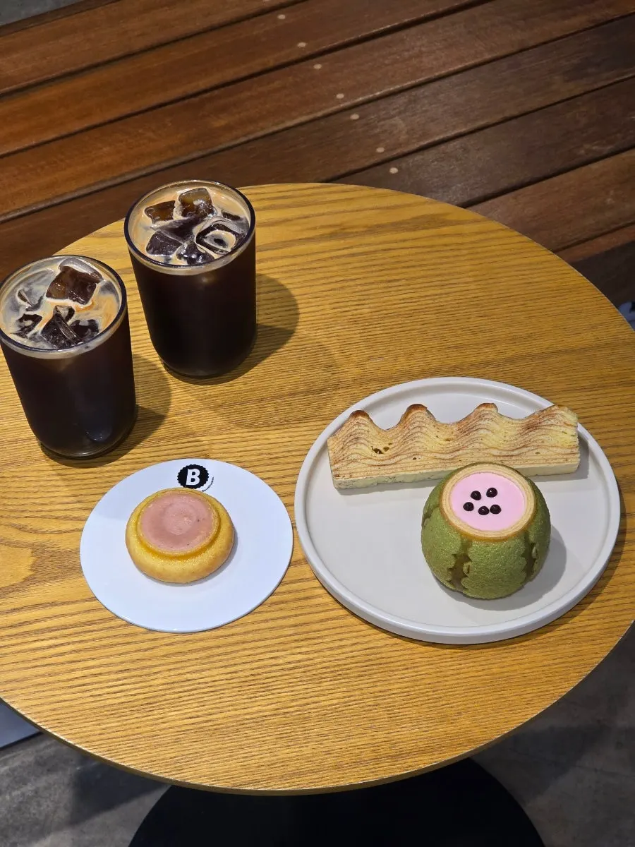 Close-up of cream-topped baumkuchen dessert