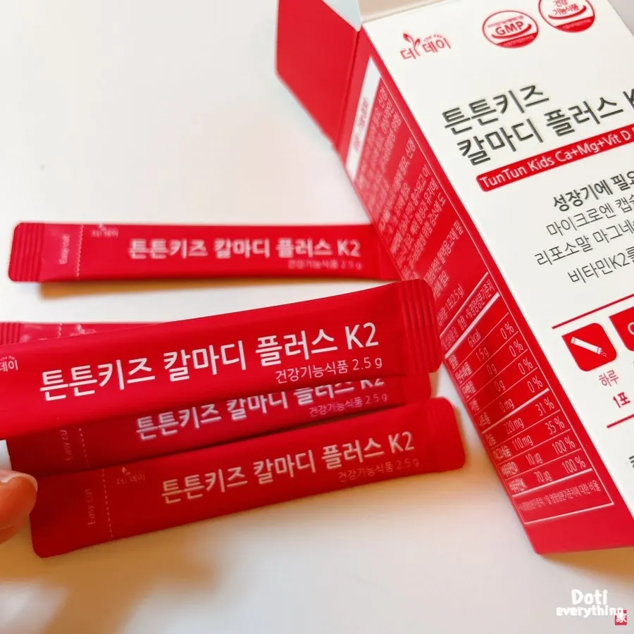 Tunteun Kids CalMadi product examined while opening it