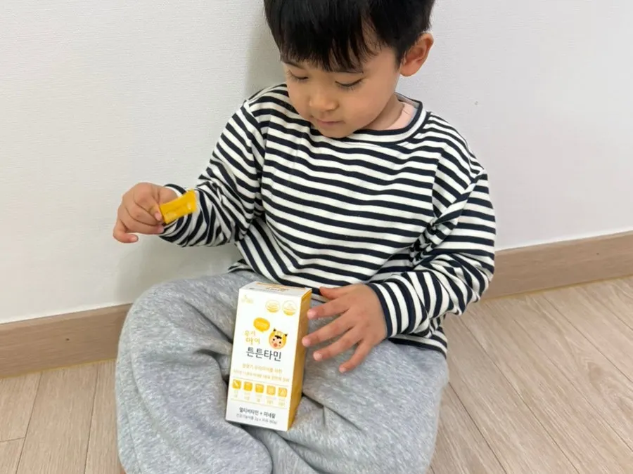 Mango-flavored multivitamin given to a child daily