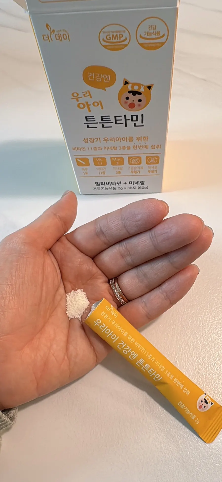 Mango-flavored Tuntuntamin given to a child