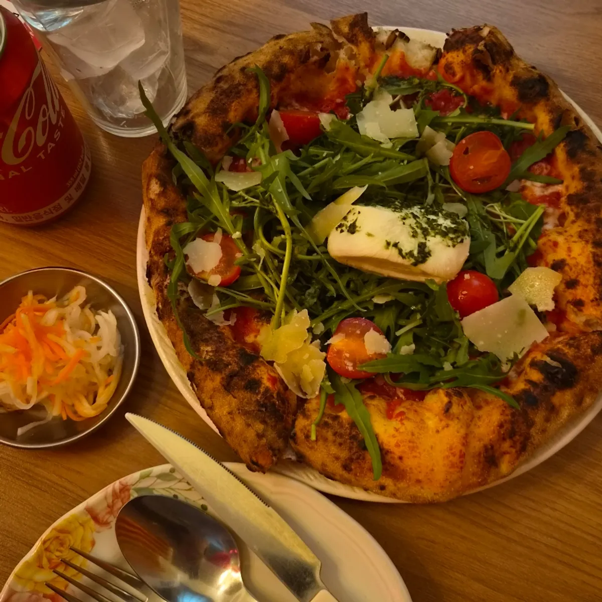 Signature photo of the arugula burrata pizza at The European Haenggung Main Branch