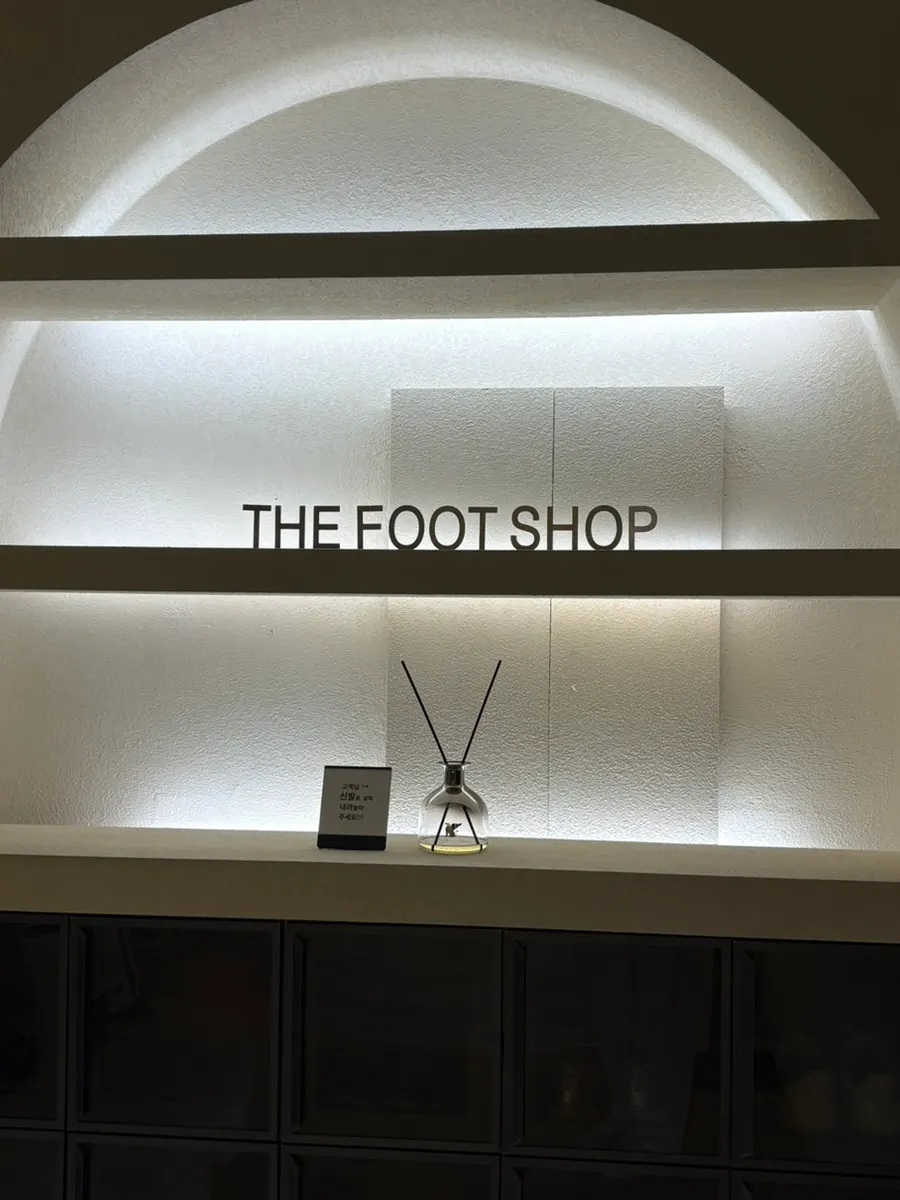 Softly lit hallway at The Foot Shop Massage Bundang Suneol