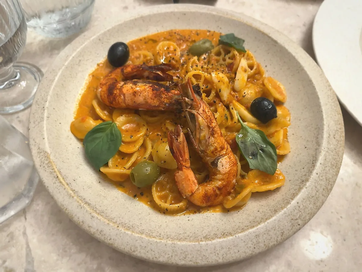 The Mignon Seoul's bisque pasta topped with grilled king prawns