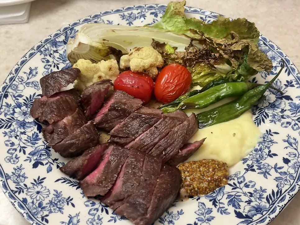 Sirloin cap steak served cooked medium