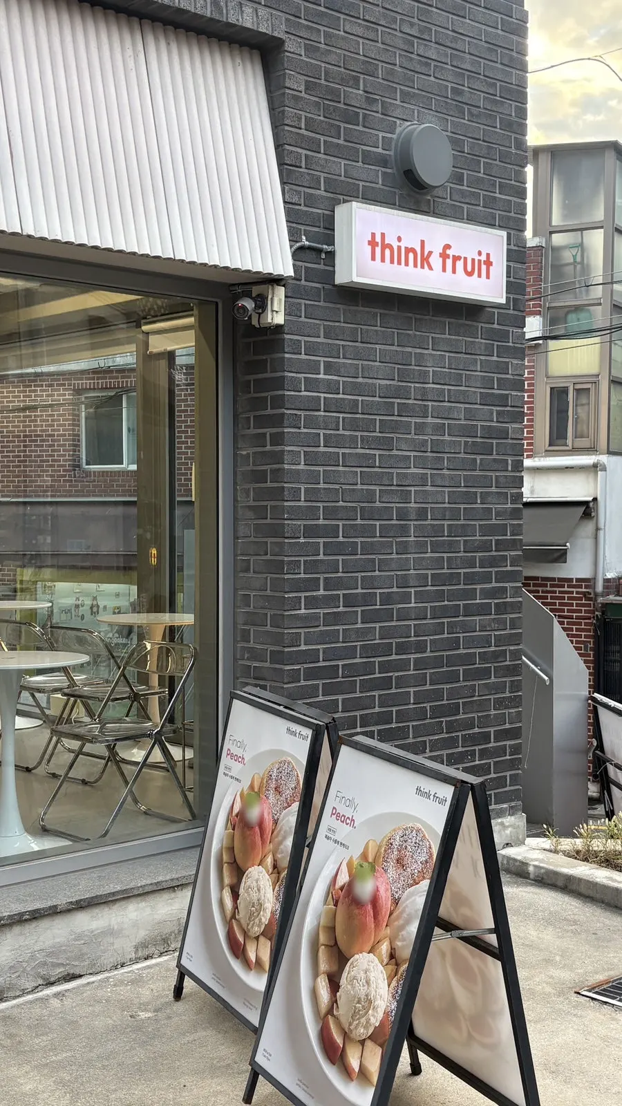 Think Fruit's exterior tucked in a quiet alley