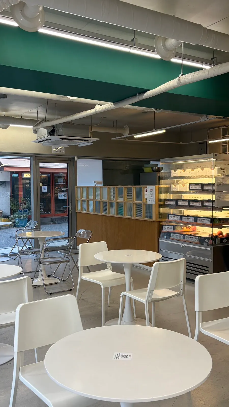 Think Fruit's interior lit by full glass windows