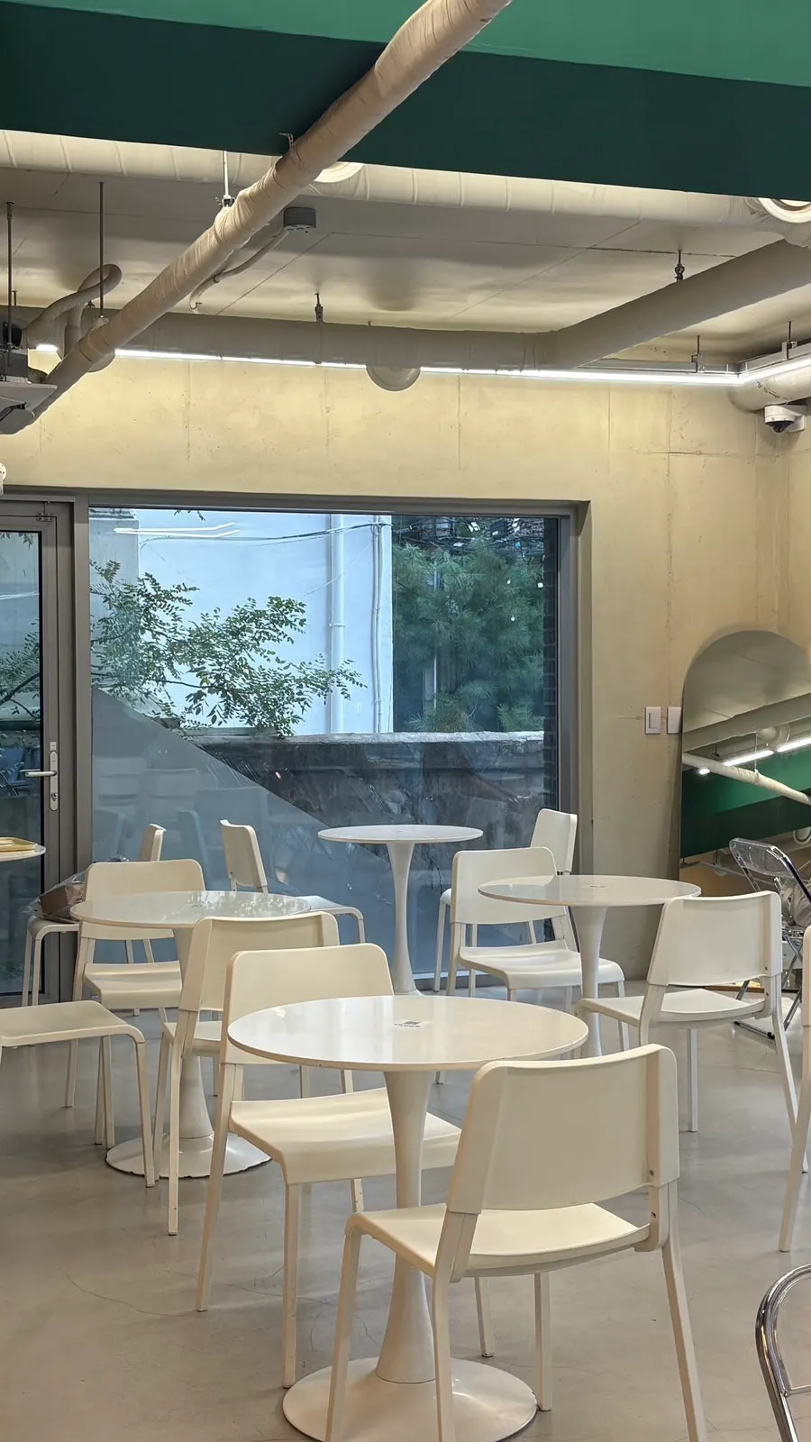Seating at Think Fruit with white interior