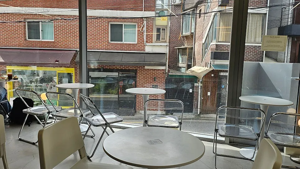 Seats inside Think Fruit opened up by floor-to-ceiling windows