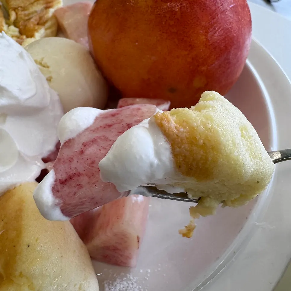 A cross-section of the fluffy soufflé cut with a fork