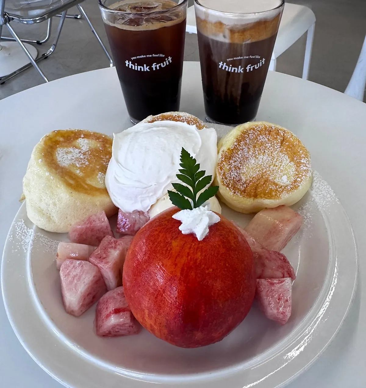 Peach soufflé and coffee on the table
