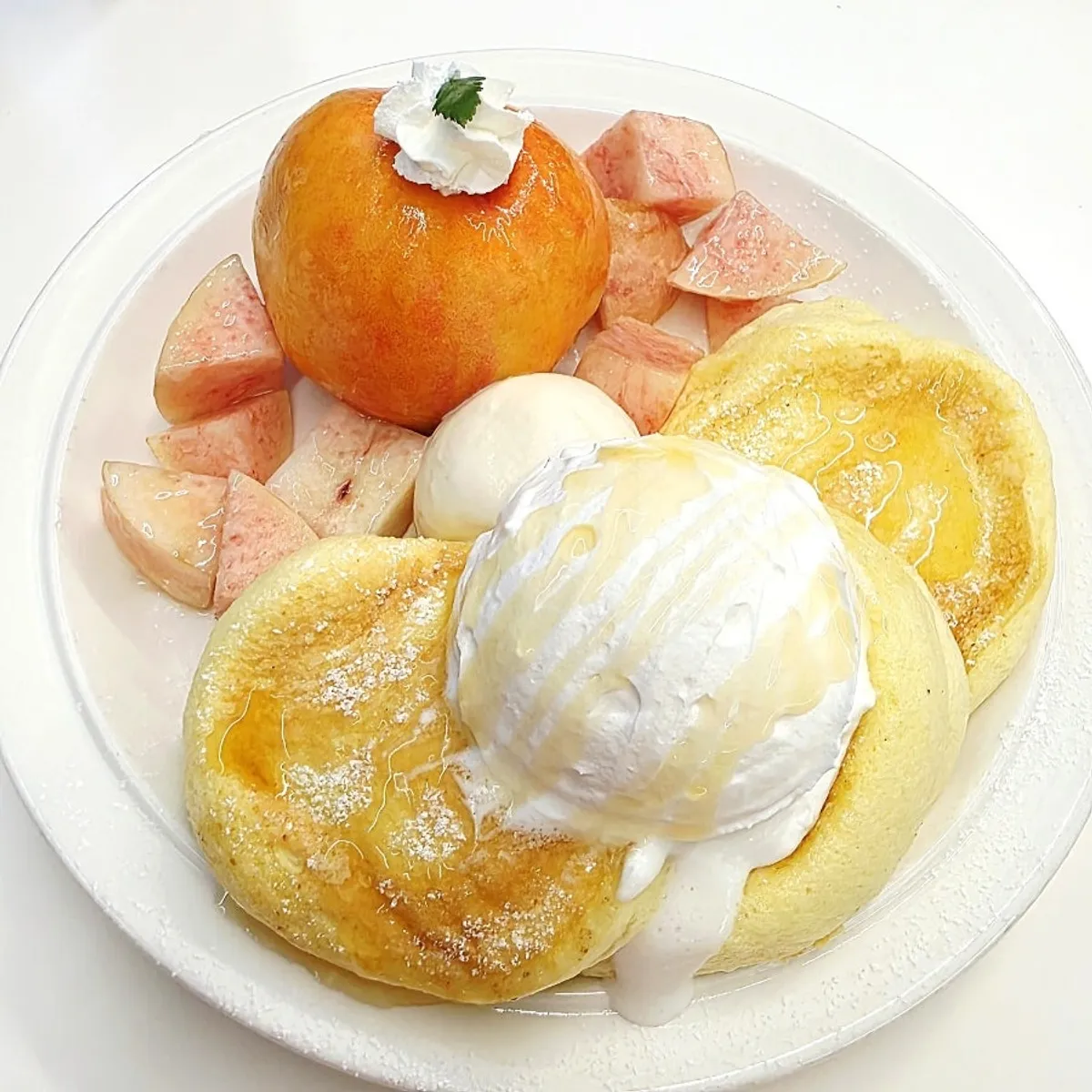 Think Fruit soufflé topped with a whole peach