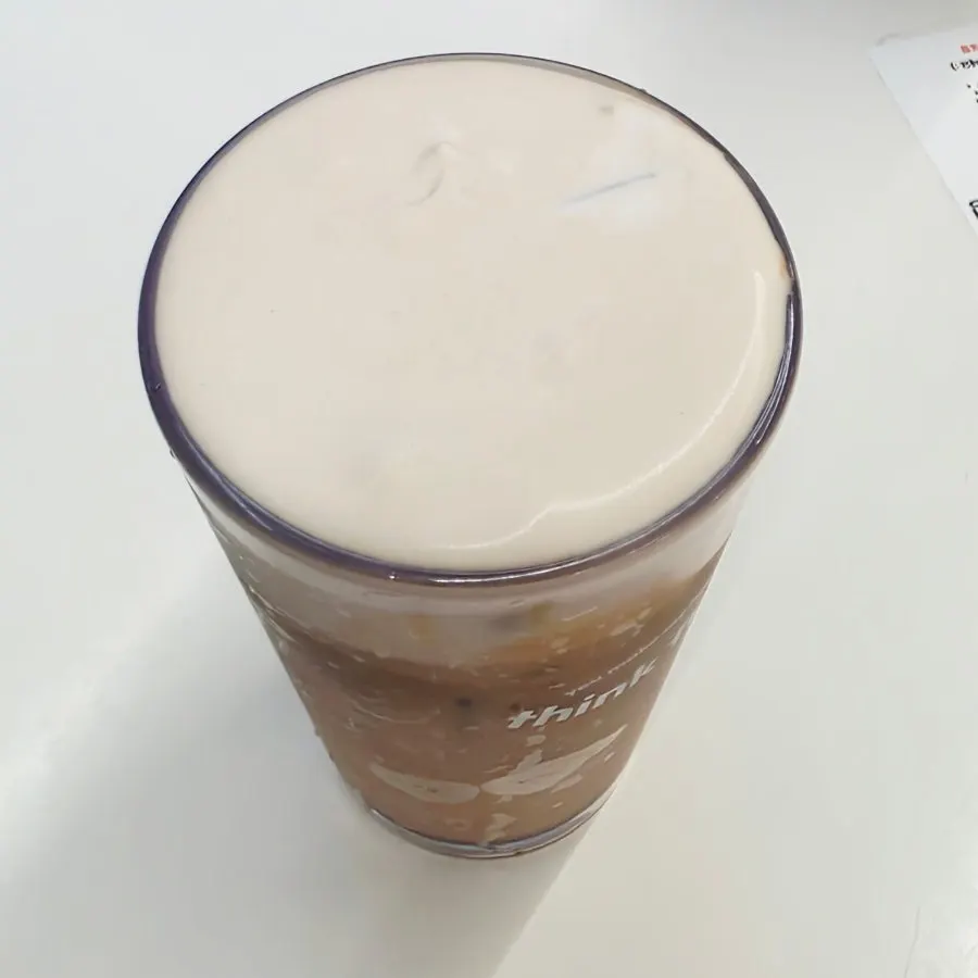 Salted cream milk tea and soufflé together on the table