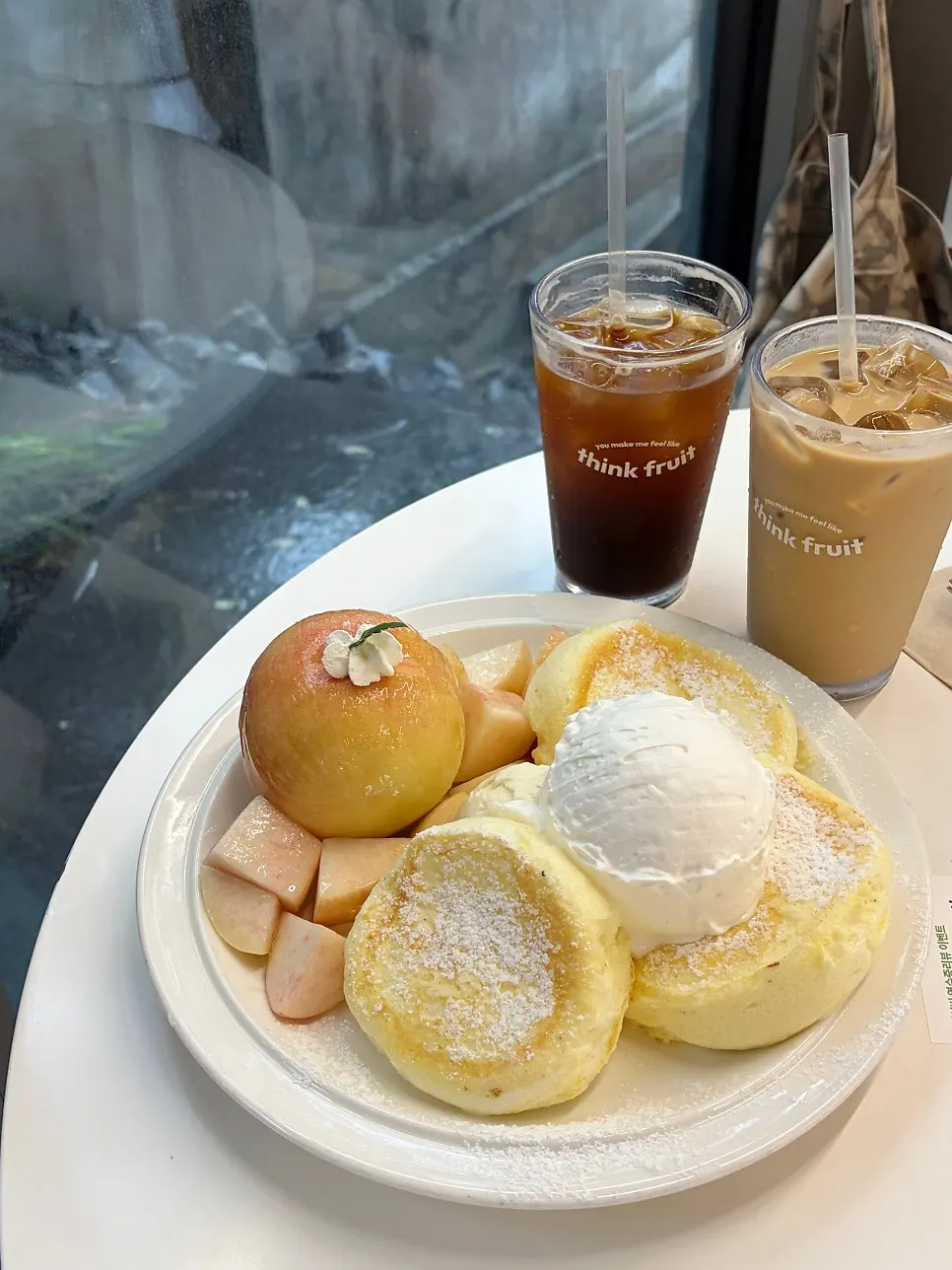 Pouring syrup over the peach soufflé