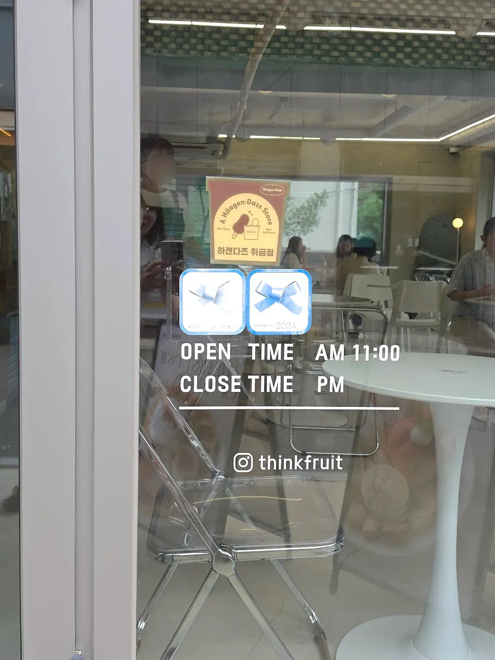 Think Fruit storefront with Blue Ribbon selection sign
