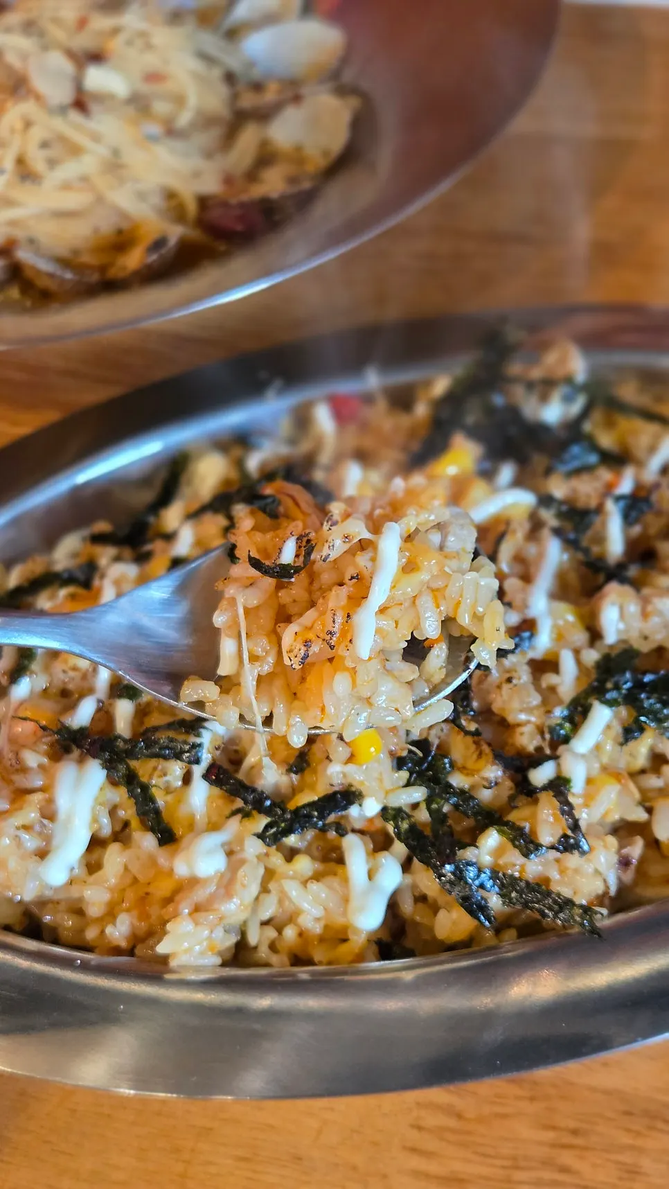 A spoonful of smoky pork rice pilaf