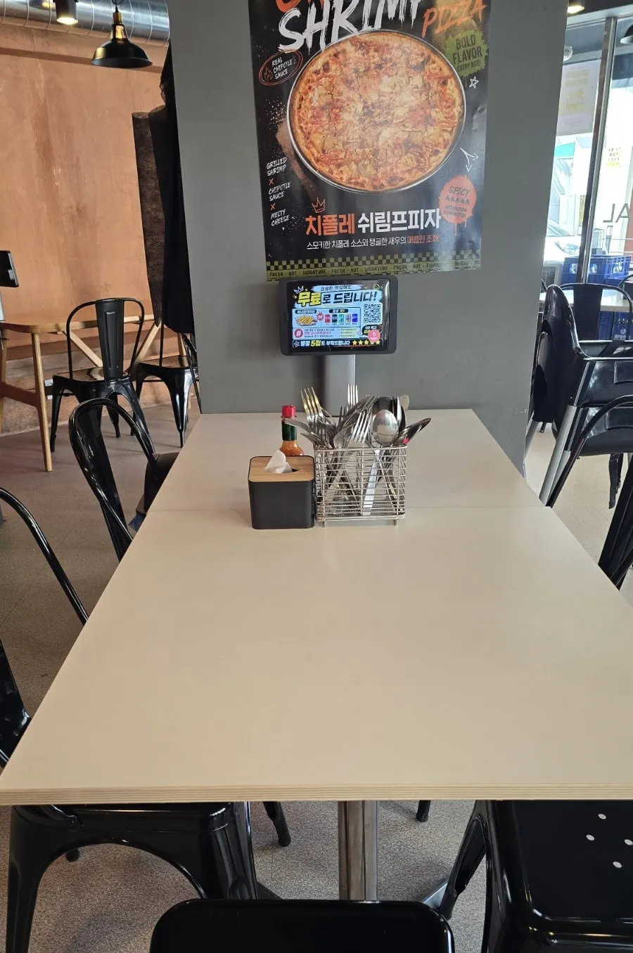 Ordering tablet mounted on a table pillar
