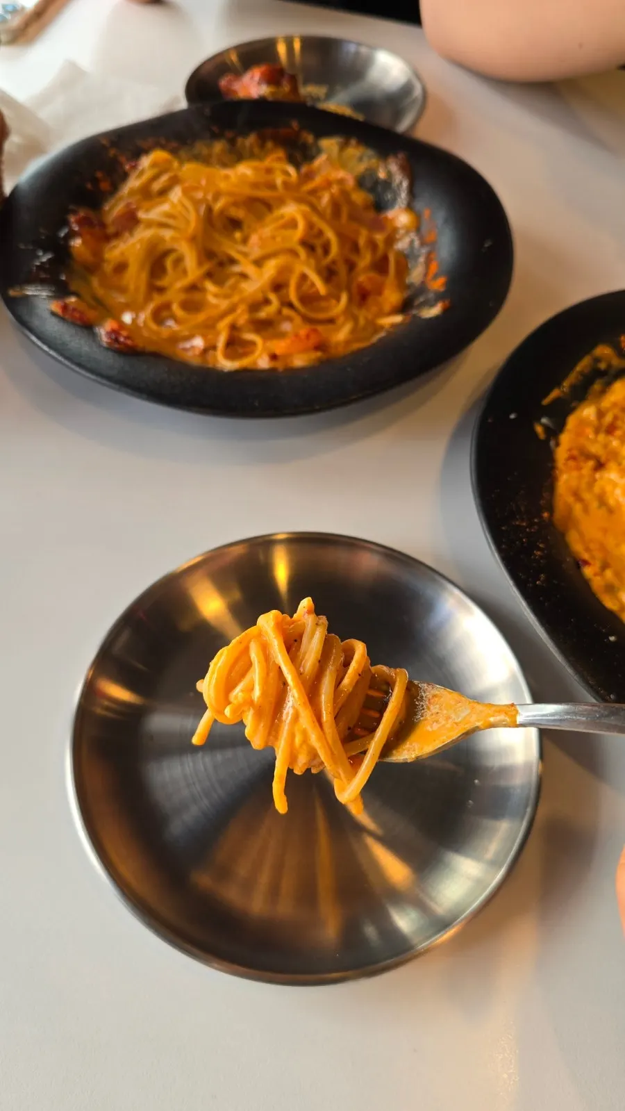 K-toowoomba pasta twirled on a fork