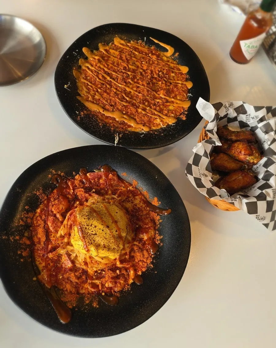 Table spread of pasta, risotto, and sides together