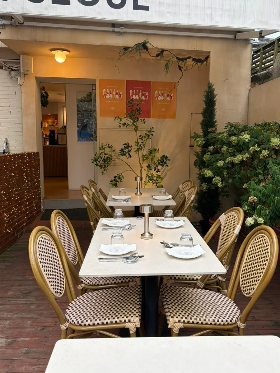 Terrace seating in front of Teen Seoul's entrance