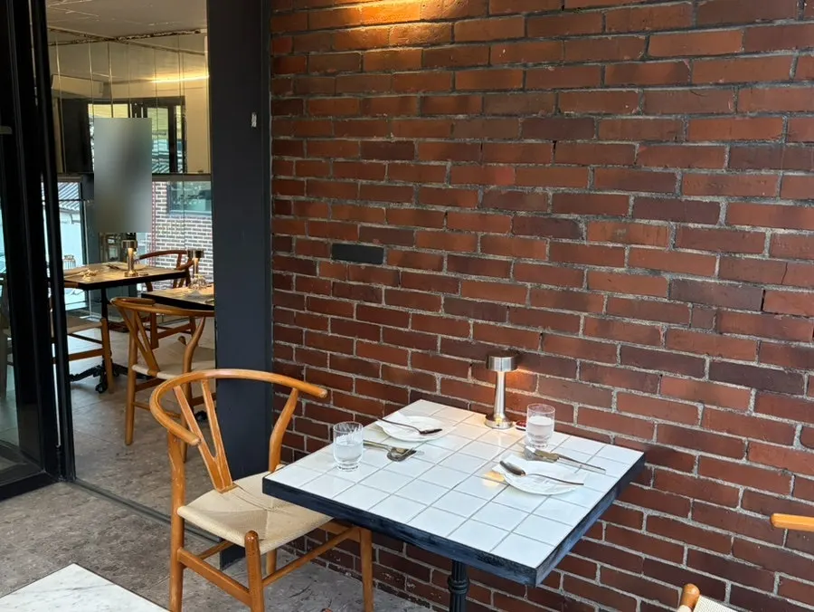 Teen Seoul's 2nd floor terrace with a view of hanok rooftops