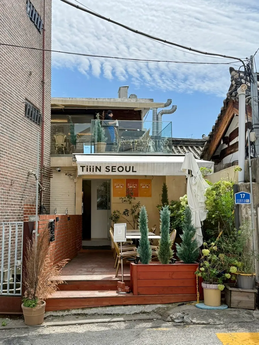 Exterior of Teen Seoul's two-story building in a Seochon alley near Gyeongbokgung Station