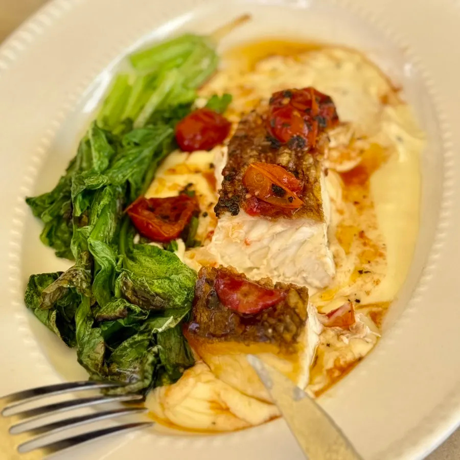 Sea bream sliced open, crisp outside and tender inside