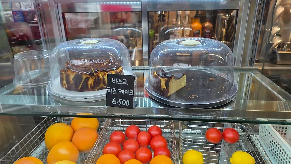 Display shelf of desserts baked fresh each morning at Tiny Dot