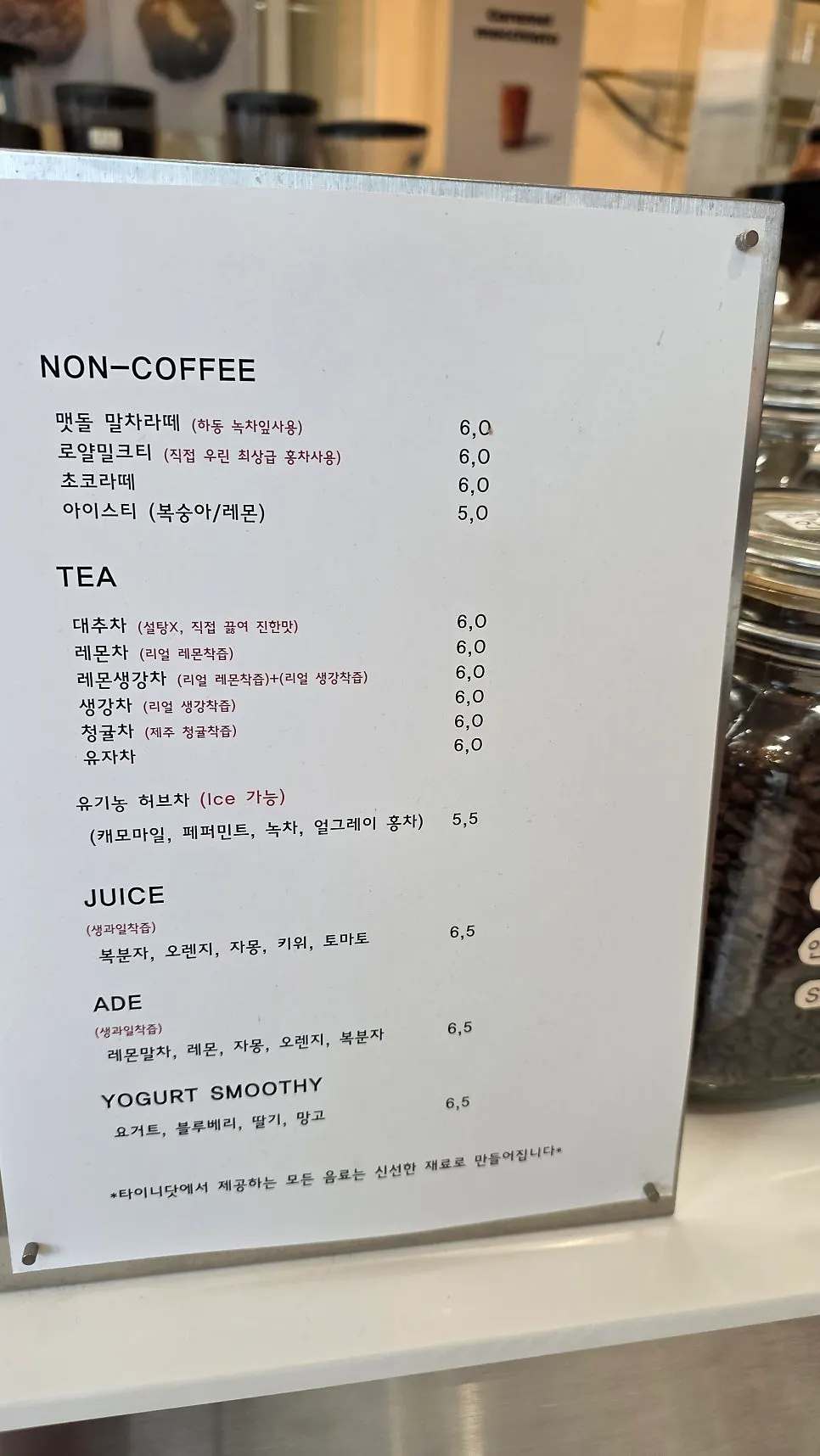 Tiny Dot's drink menu board