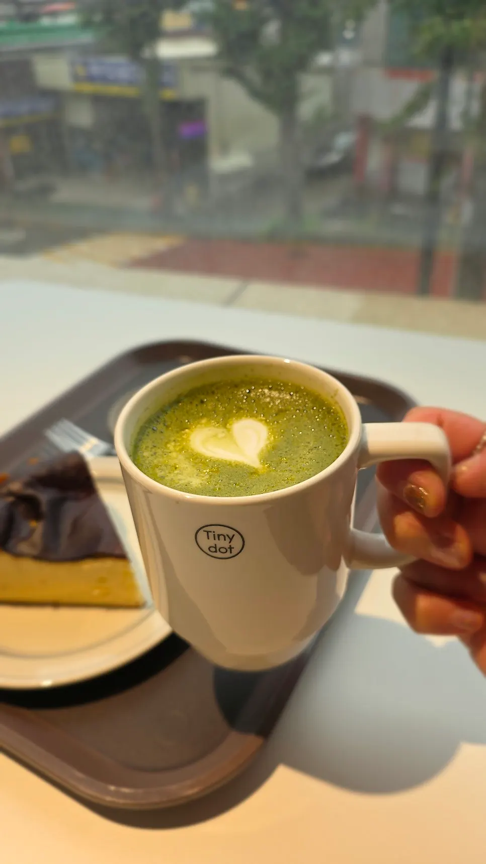 Close-up of the smooth stone-mill matcha latte