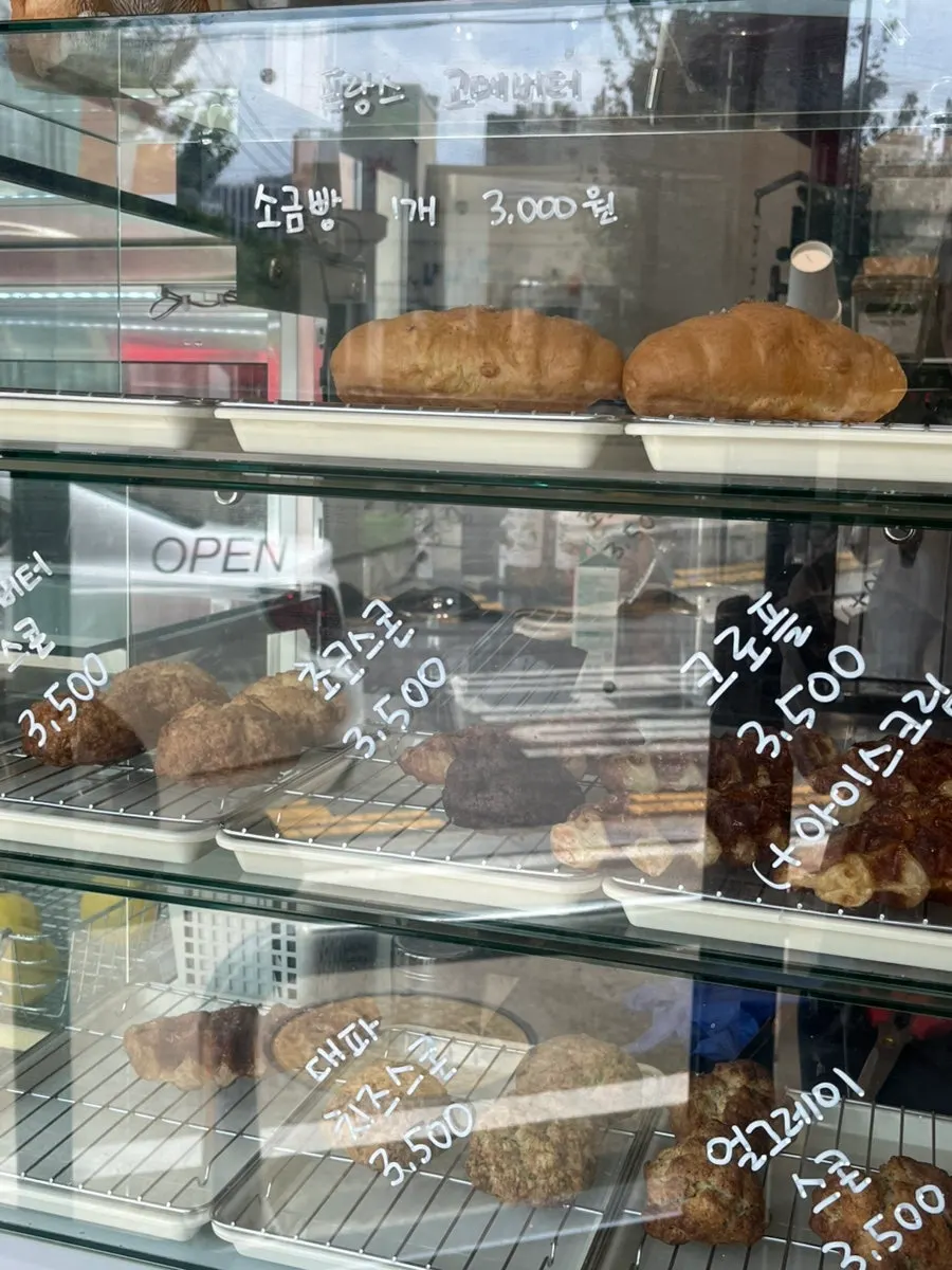 Coffee menu board featuring Orange Dot
