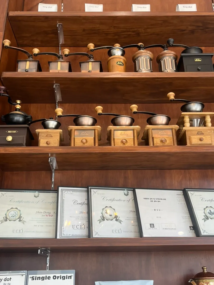 Dessert case with scones, salt bread, and more
