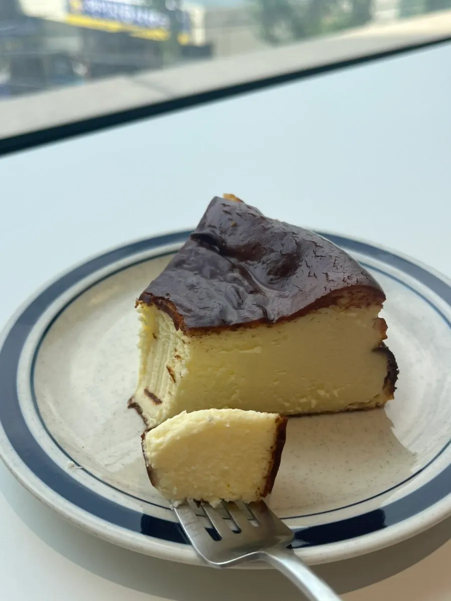Cross-section of the dense Basque cheesecake