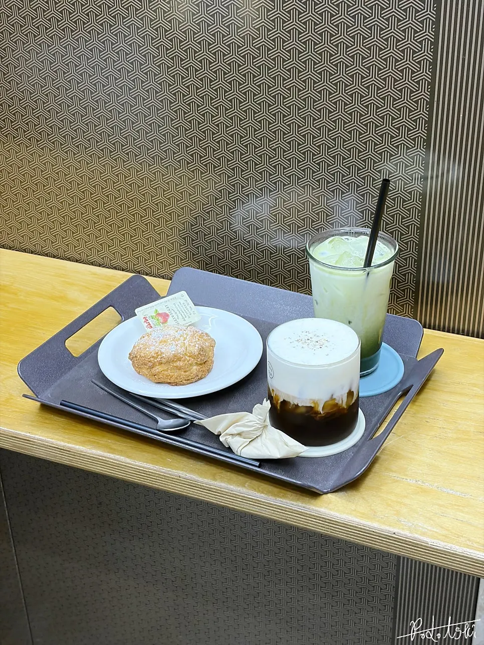 Tray space beside the elevator at Tiny Dot