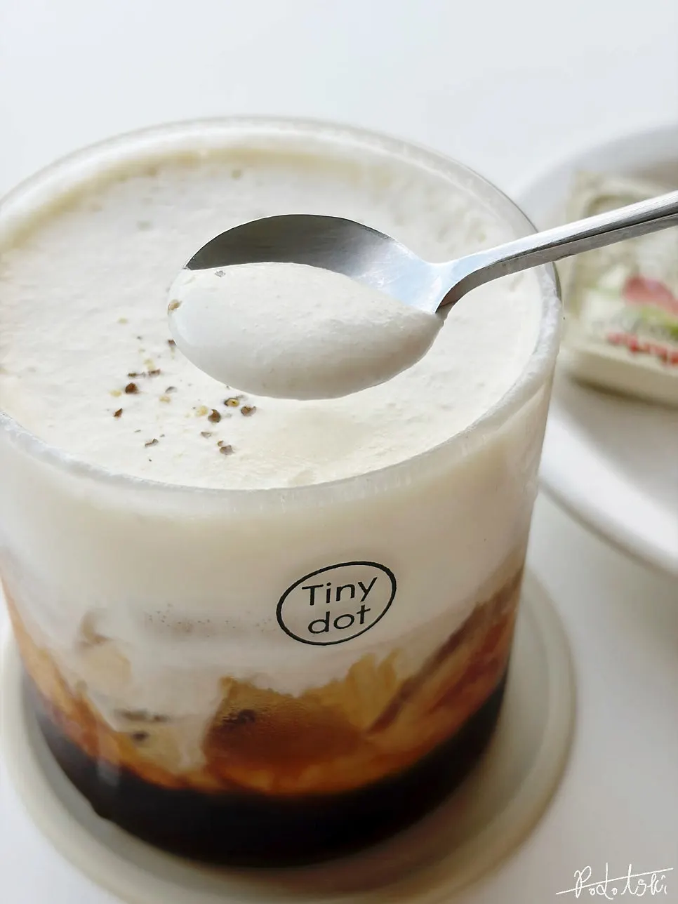 Tiny Dot's signature deulkkae-dat topped with perilla cream