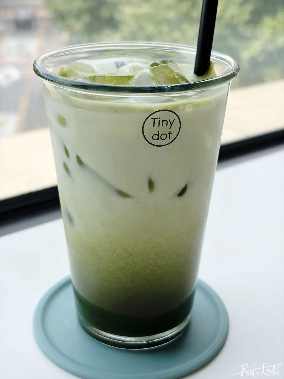 A cup of Tiny Dot's stone-mill matcha latte