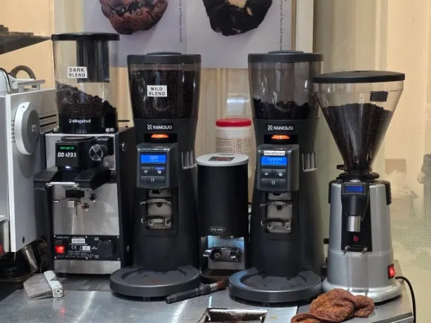 Sign listing hand drip beans by country of origin