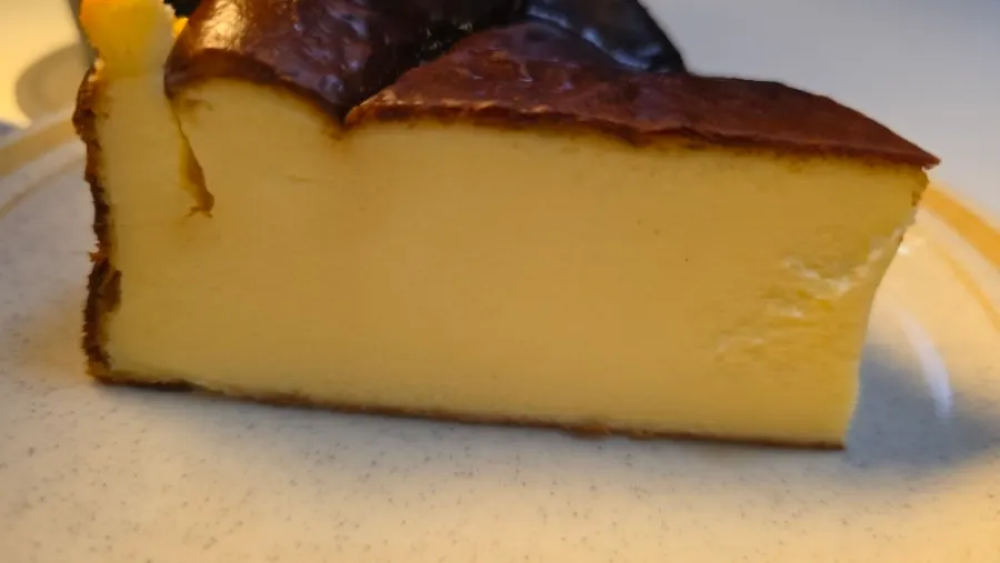 A slice of Basque cheesecake made with antibiotic-free eggs