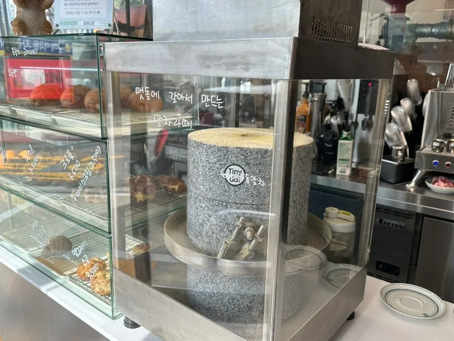 The stone-mill matcha corner on Tiny Dot's 1st floor
