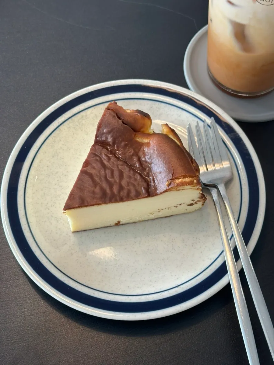 Digging into the Basque cheesecake with a fork