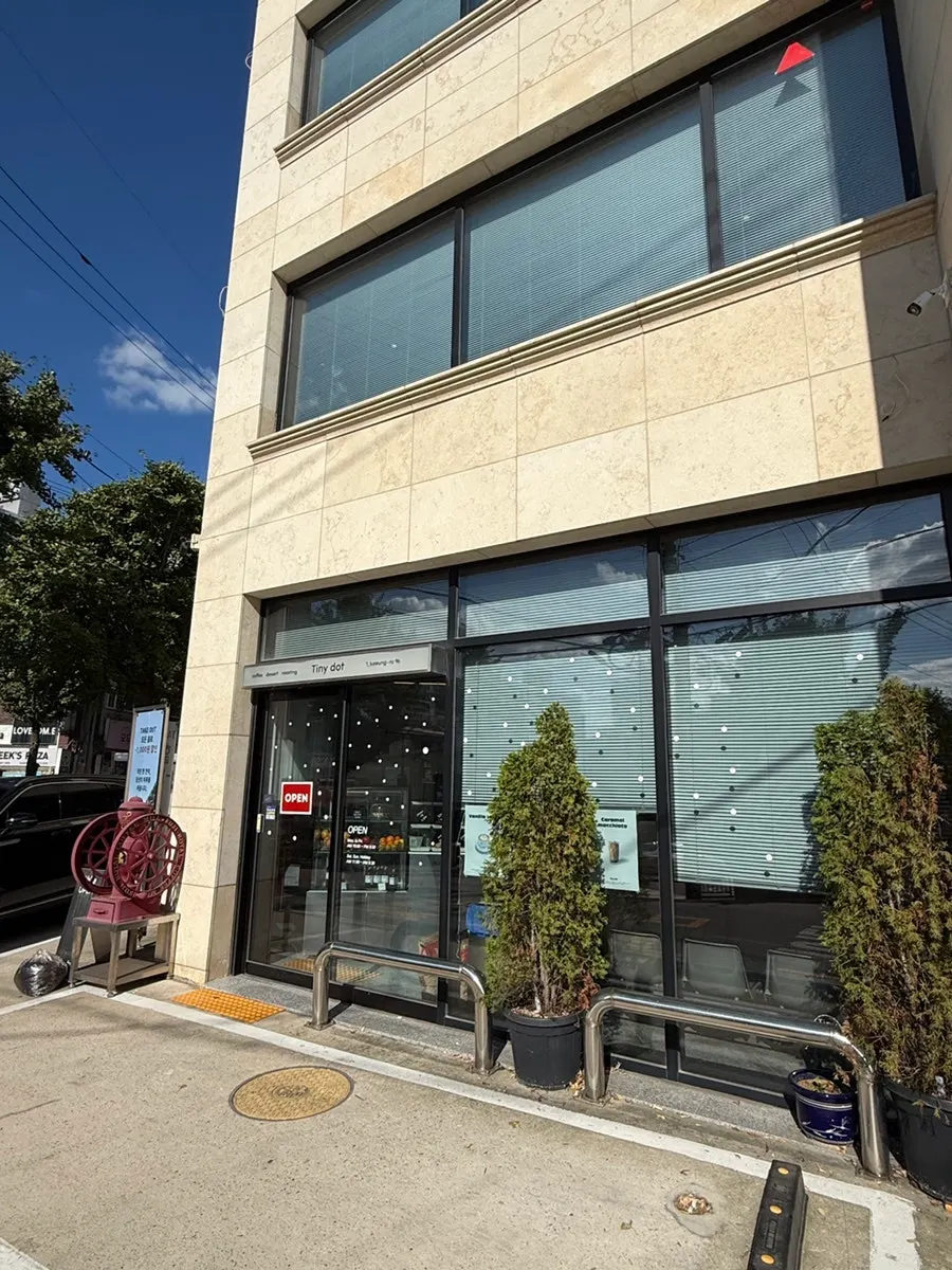 Exterior of Tiny Dot, which occupies an entire four-story building in Juan