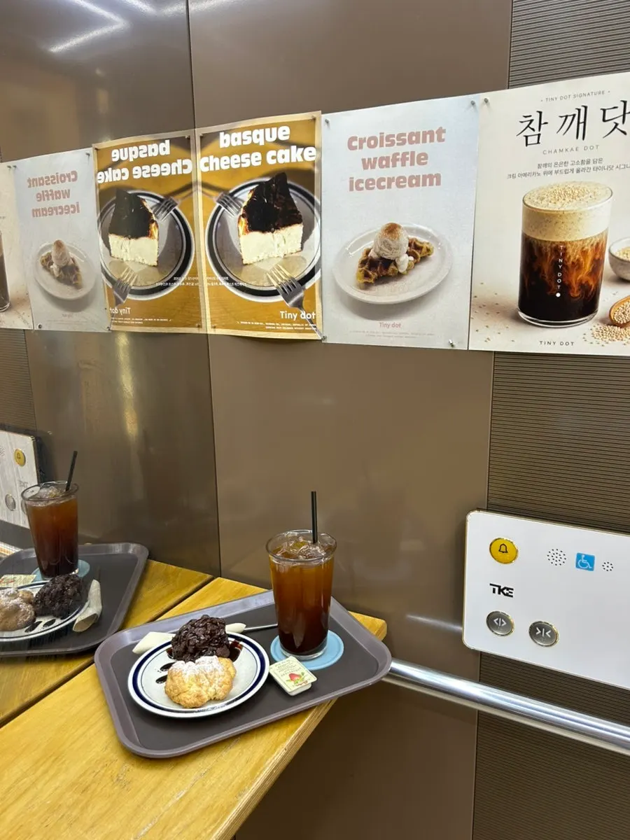 Small drink table inside the Tiny Dot elevator