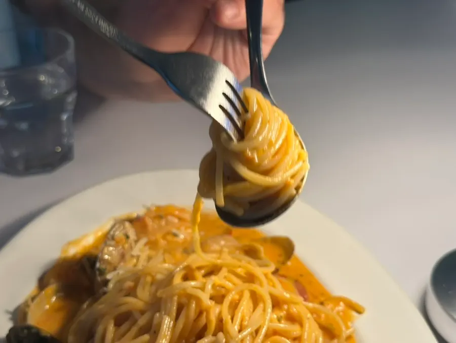 Generous serving of seafood rosé pasta noodles