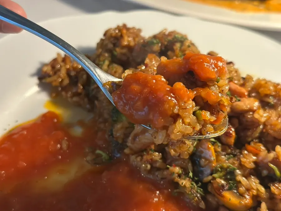 Chicken pilaf served with salsa sauce