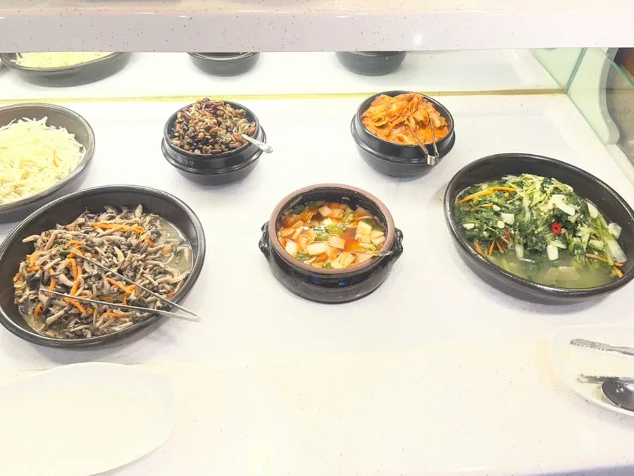 Banchan and grilled fish making up the set menu