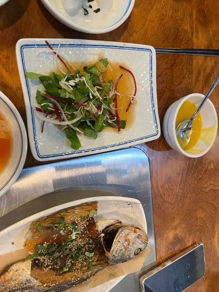 Bowls of nabak kimchi and mul kimchi